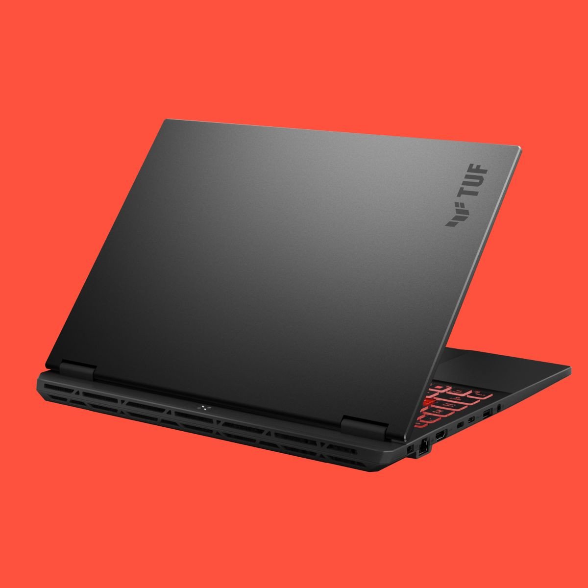 Asus TUF A14 2025, một lựa chọn **laptop giá rẻ card đồ họa tốt**, nổi bật trên nền đỏ.