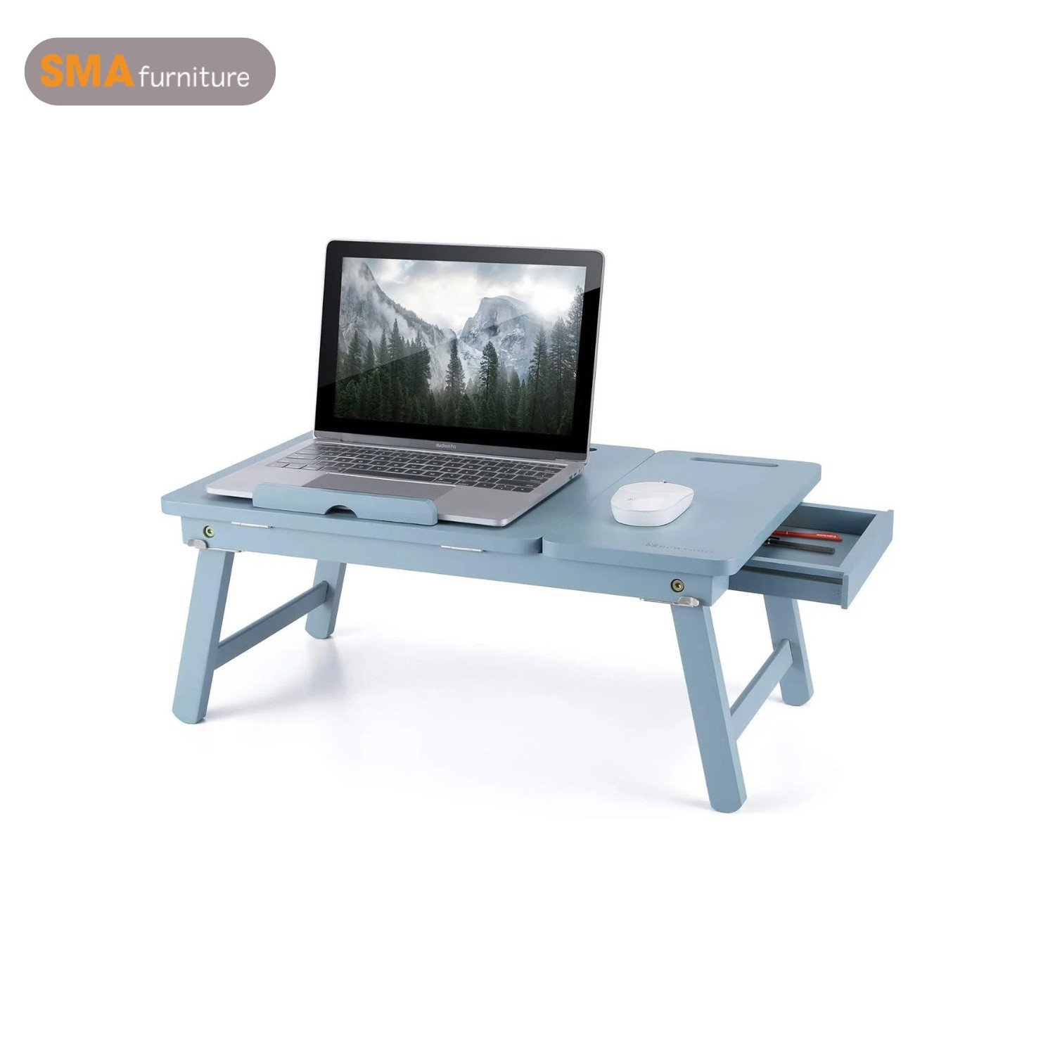 Bàn laptop nằm trên giường có khe rãnh giữ thiết bị thông minh