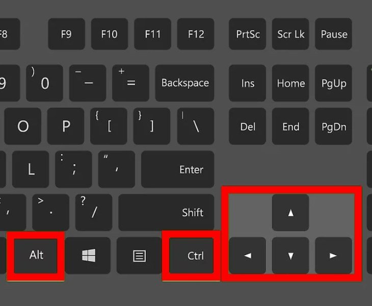 Bàn phím laptop với các phím Ctrl, Alt và mũi tên, minh họa tổ hợp phím xoay màn hình laptop nhanh chóng