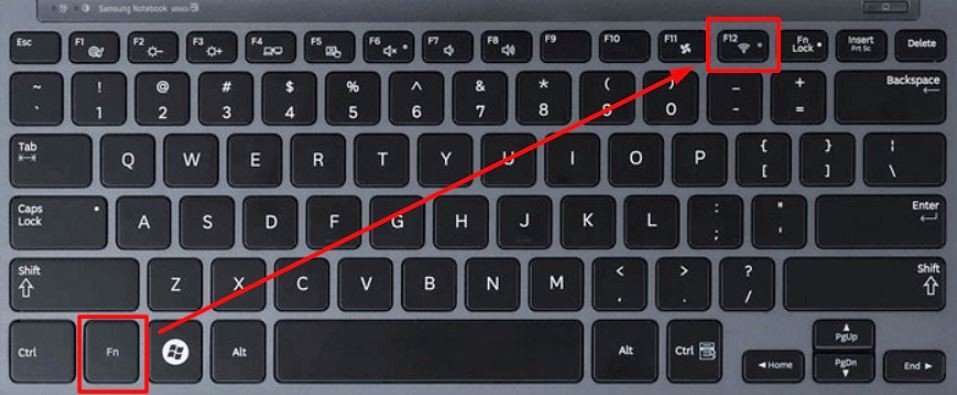 Bàn tay đang tìm kiếm phím tắt chức năng Wifi trên bàn phím laptop