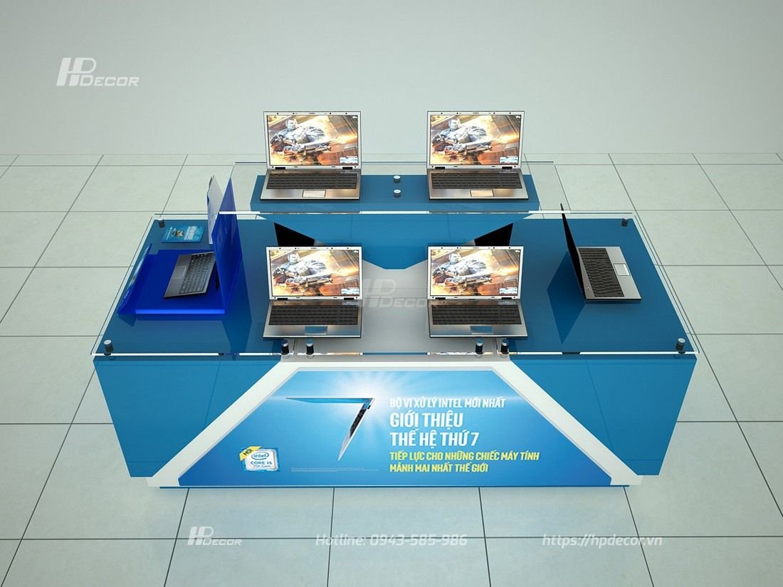 Bàn trải nghiệm laptop 2 tầng với mặt kính sang trọng, nơi khách hàng có thể dùng thử các mẫu laptop