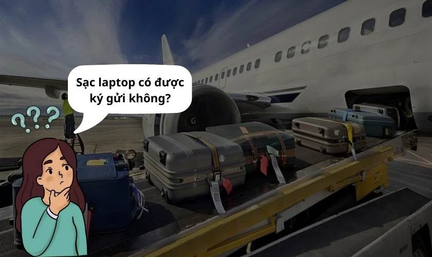 Bộ sạc laptop và dây cáp chuẩn bị cho chuyến bay