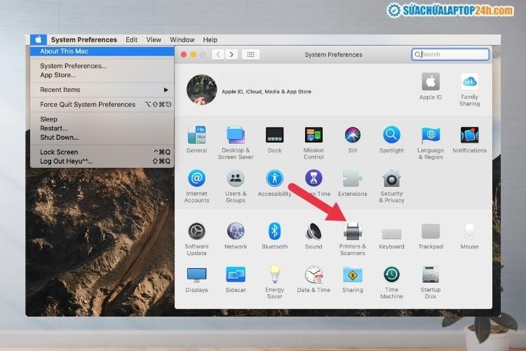 Chọn "Printers &amp; Scanners" trong System Preferences của macOS để kết nối máy in
