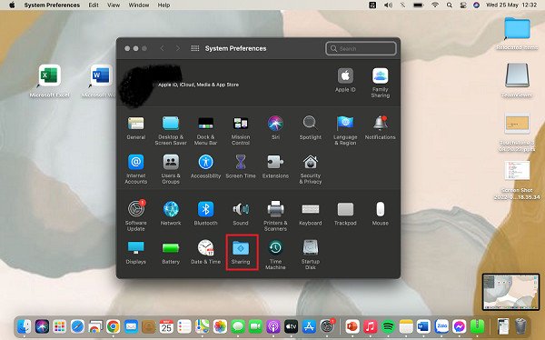 Chọn Sharing trong System Preferences