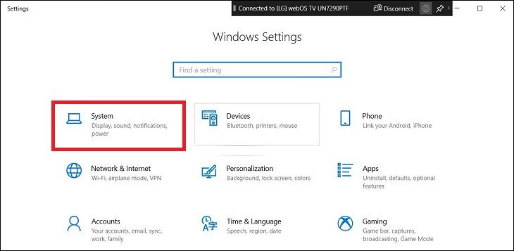 Chọn System trong cài đặt để tiếp tục ngắt kết nối laptop với tivi
