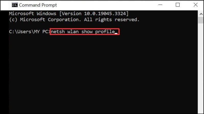 Cửa sổ Command Prompt hiển thị lệnh "netsh wlan show profile", dùng để kiểm tra các cấu hình mạng Wi-Fi đã lưu trên laptop