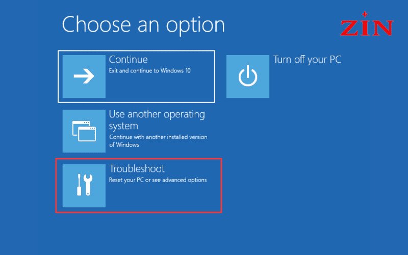 Giao diện Choose an option khi sửa lỗi laptop bị treo Restarting, chọn Troubleshoot