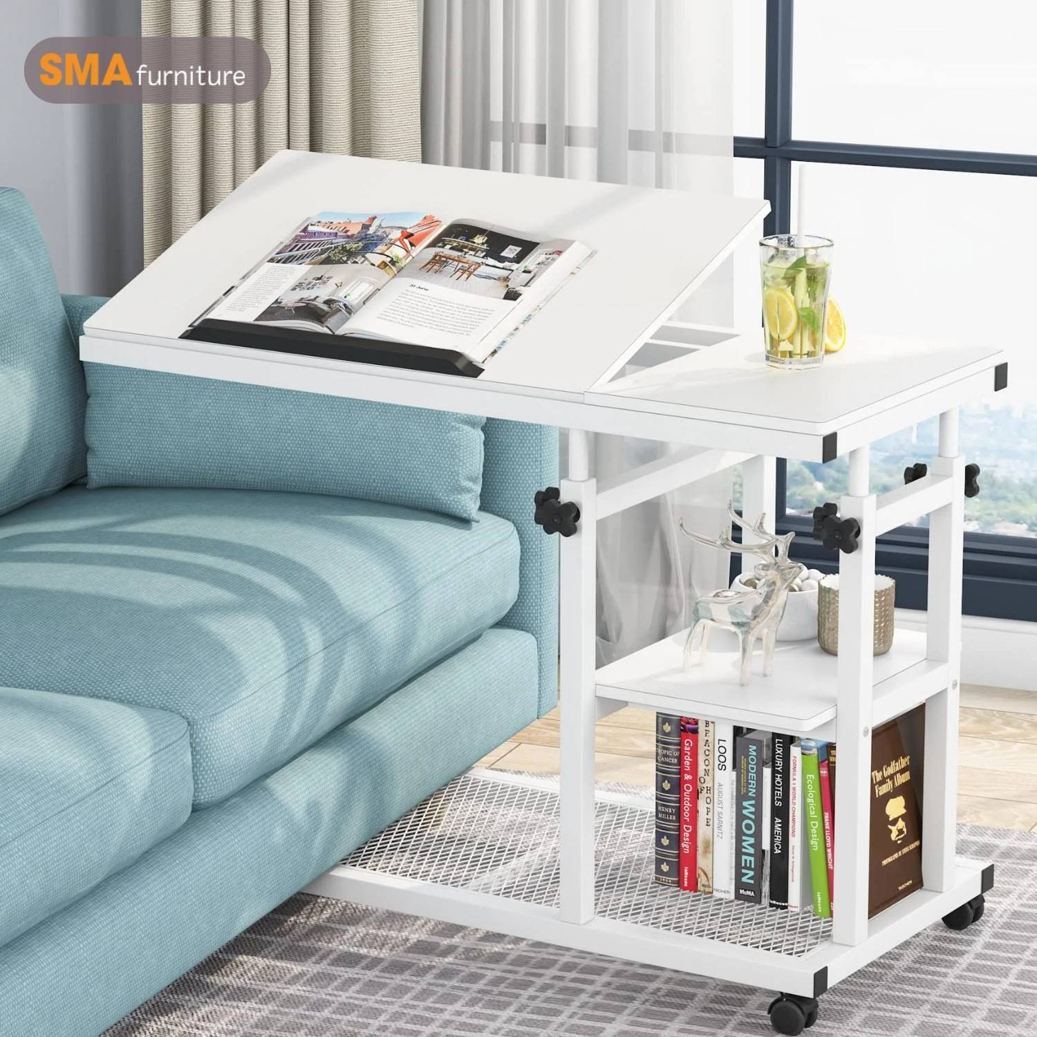 Góc làm việc với bàn laptop nằm trên giường có kệ sách