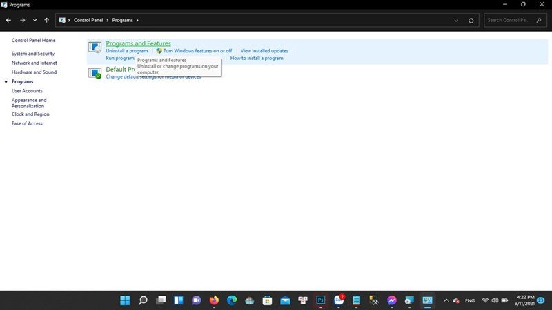 hình ảnh giao diện Control Panel trên Windows 11, hiển thị tùy chọn "Programs and Features"