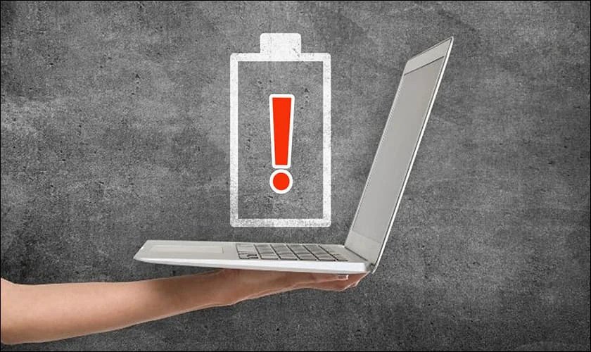 Hình ảnh laptop đang sạc với biểu tượng pin và dấu hỏi, minh họa các câu hỏi thường gặp khi kiểm tra số lần sạc laptop