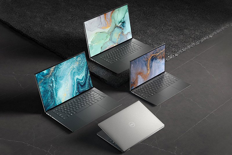 Hình ảnh một người dùng đang sử dụng laptop Dell trong môi trường văn phòng hoặc doanh nghiệp