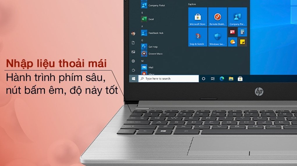Laptop HP 240 G8 14 inch màu bạc trên bàn làm việc, phù hợp cho học tập và văn phòng