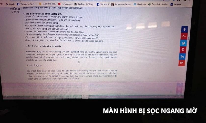 Màn hình laptop hiển thị nhiều sọc ngang mờ, cho thấy vấn đề hiển thị
