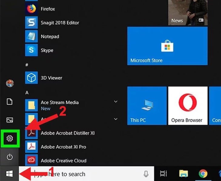 Nhấp vào biểu tượng Start và chọn Settings để mở cài đặt hệ thống Windows
