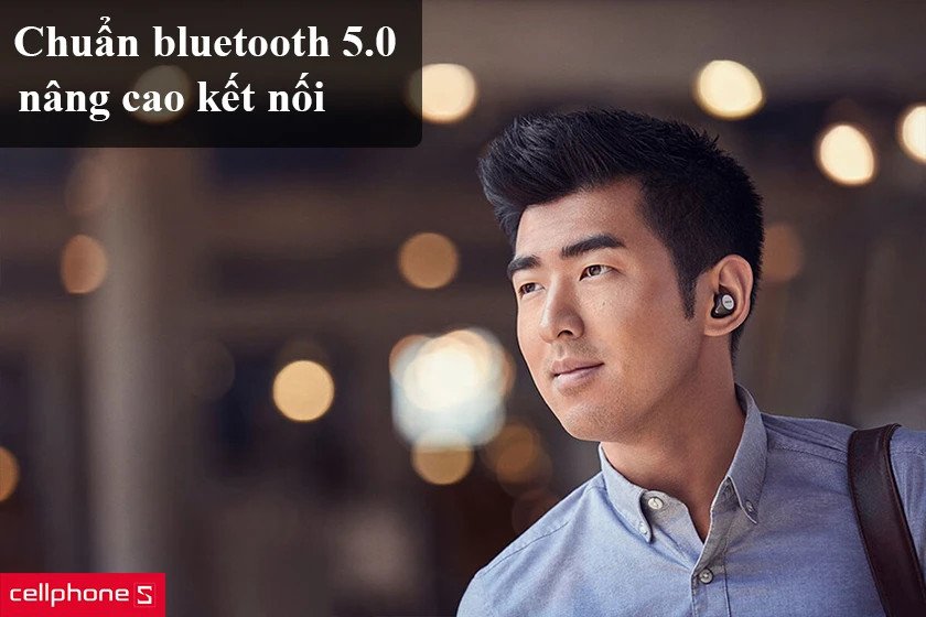 Tai nghe không dây Jabra Elite 75t đặt cạnh điện thoại, minh họa kết nối Bluetooth