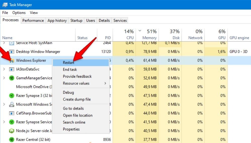 Task Manager với Windows Explorer được chọn, chuẩn bị khởi động lại laptop.