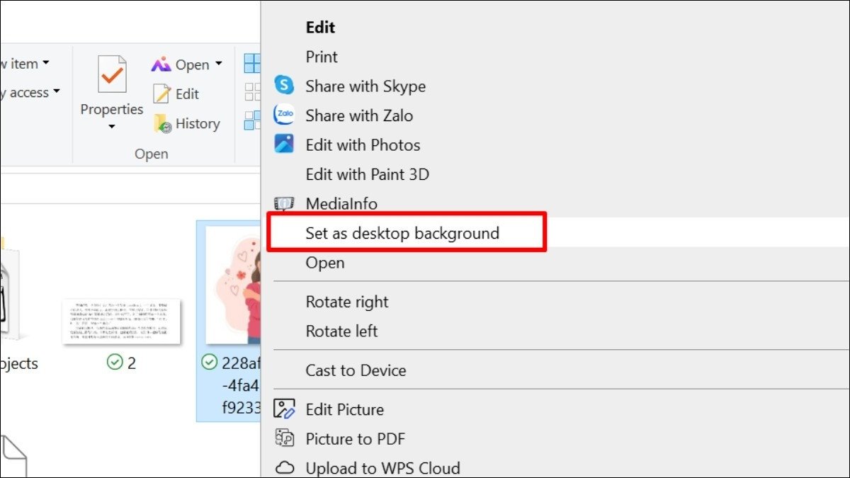 Thao tác chọn 'Set as desktop background' để cài đặt hình nền laptop 4K biển trên Windows