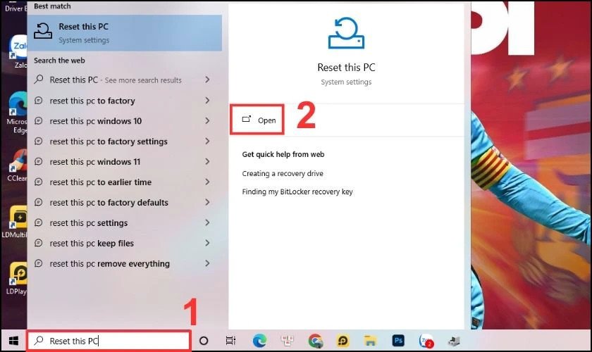 Tìm kiếm "Reset this PC" để khôi phục cài đặt gốc