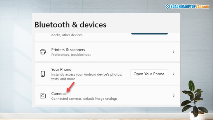 Tìm và chọn mục Cameras trong Bluetooth &amp; devices để tùy chỉnh