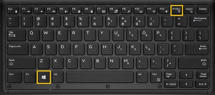 Tổ hợp phím Windows và Print Screen được nhấn trên bàn phím máy tính Dell