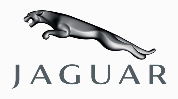 Jaguar của nước nào? Lịch sử và Định vị thương hiệu 2026 Chiếc Jaguar E-Type cổ điển màu đỏ
