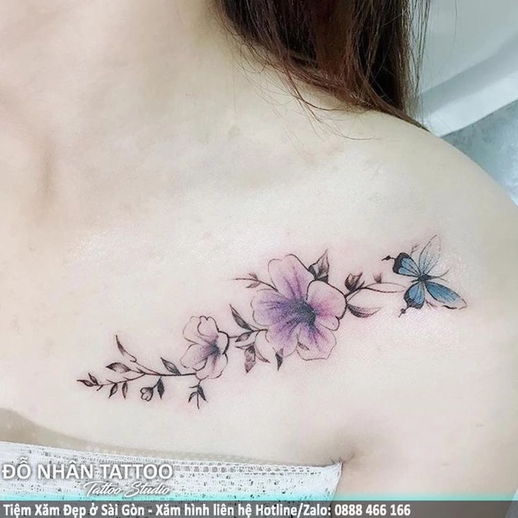 Hình xăm hoa và lá với kỹ thuật fine line trên vai