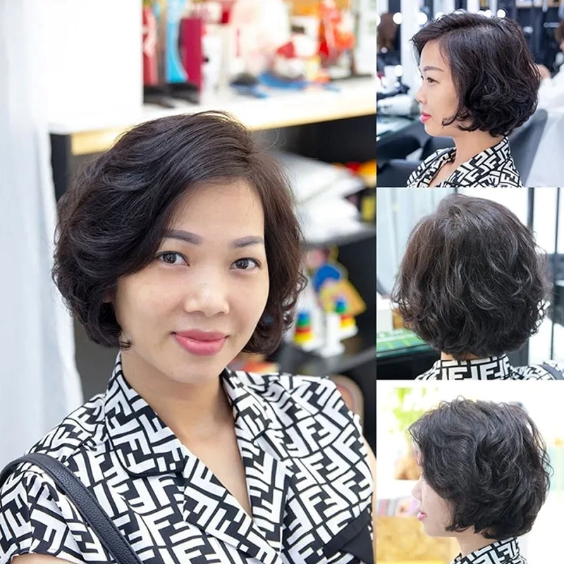 Phụ nữ trung niên với mái tóc xoăn ngắn phồng